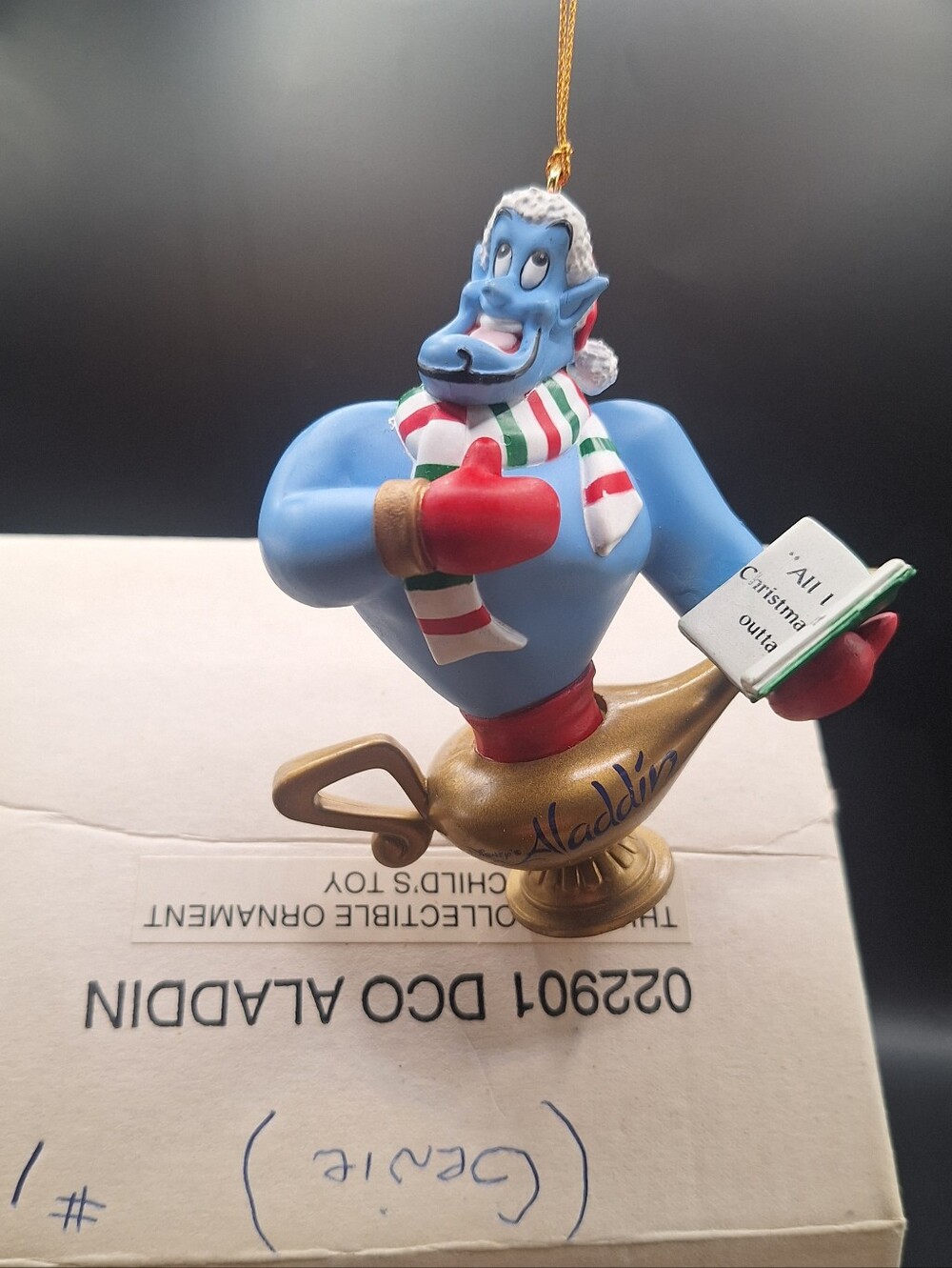 Disney Christmas ornament features the beloved Genie character from Aladdin,